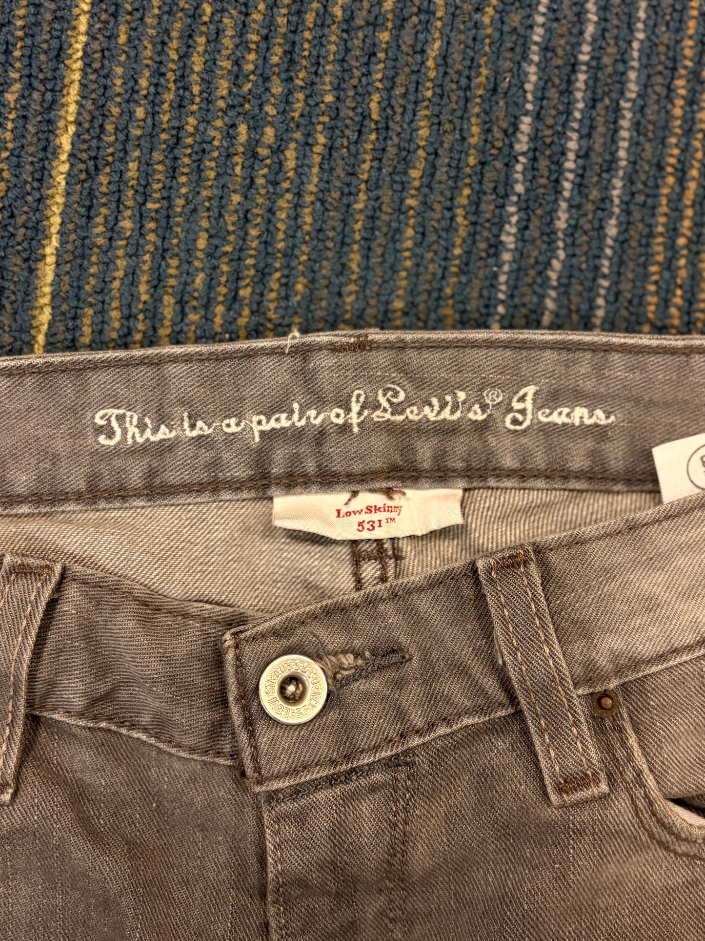 "Bite Me' Distressed Skinny Jeans
