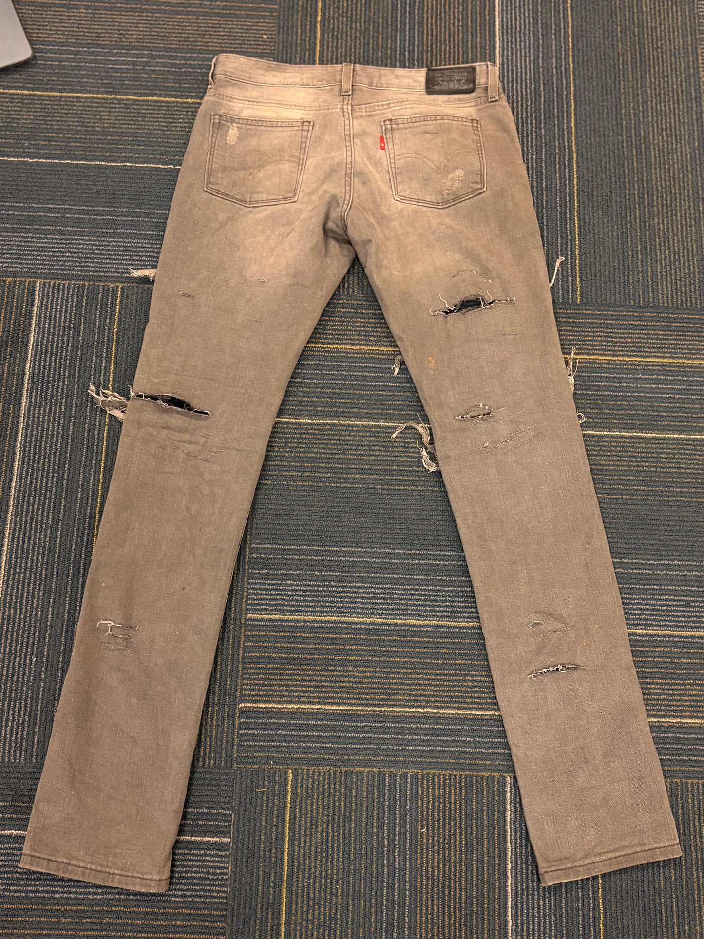 "Bite Me' Distressed Skinny Jeans