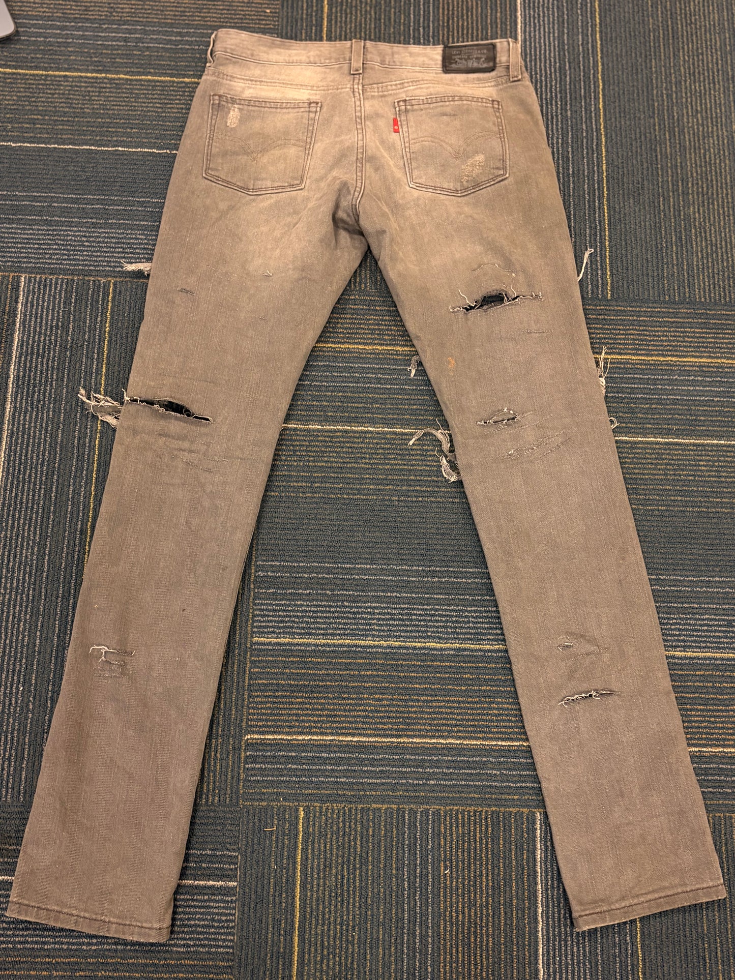 "Bite Me' Distressed Skinny Jeans
