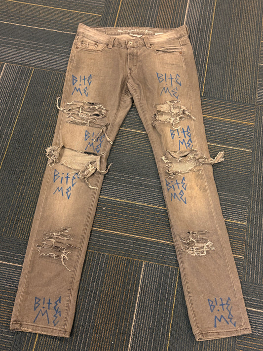 "Bite Me' Distressed Skinny Jeans